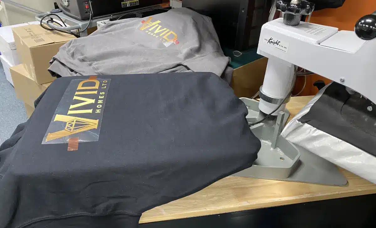 Vivid Homes Custom-Branded Apparel - Heat Press Process - 1