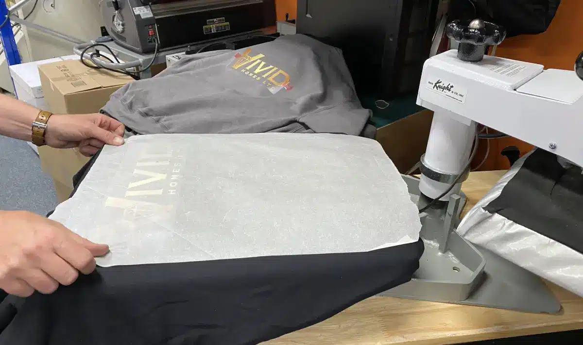 Vivid Homes Custom-Decorated Apparel by Branding Centres - Heat Press Process 2