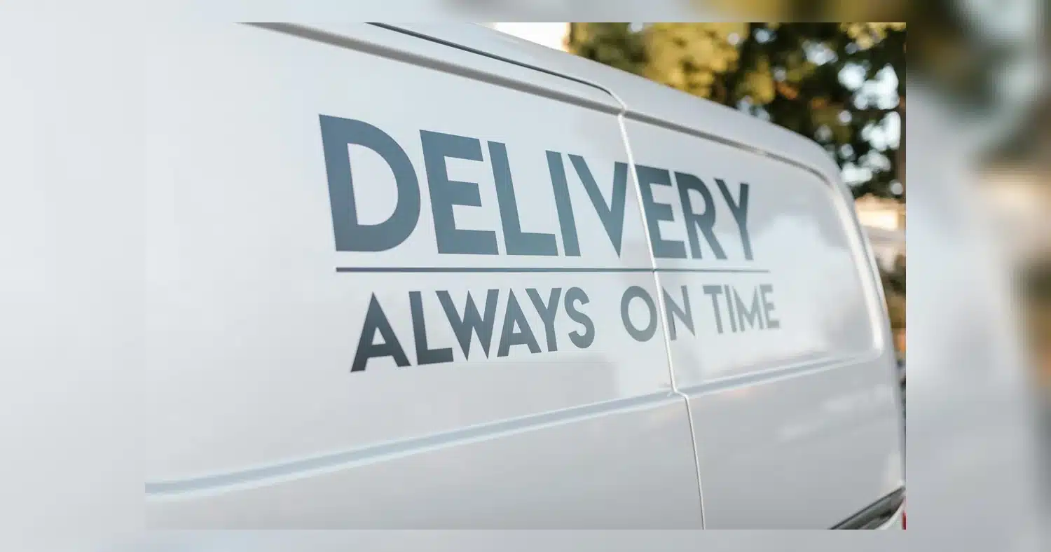 How long does a vehicle wrap last - vinyl wrap on a delivery vehicle showing real-world wear after several years