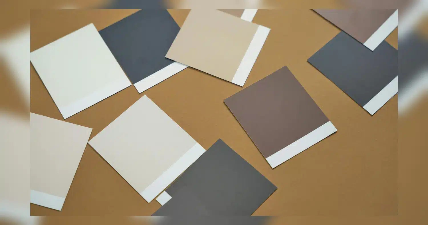 what is gsm in printing , An overhead shot of various color swatches on a brown surface, illustrating design choices.