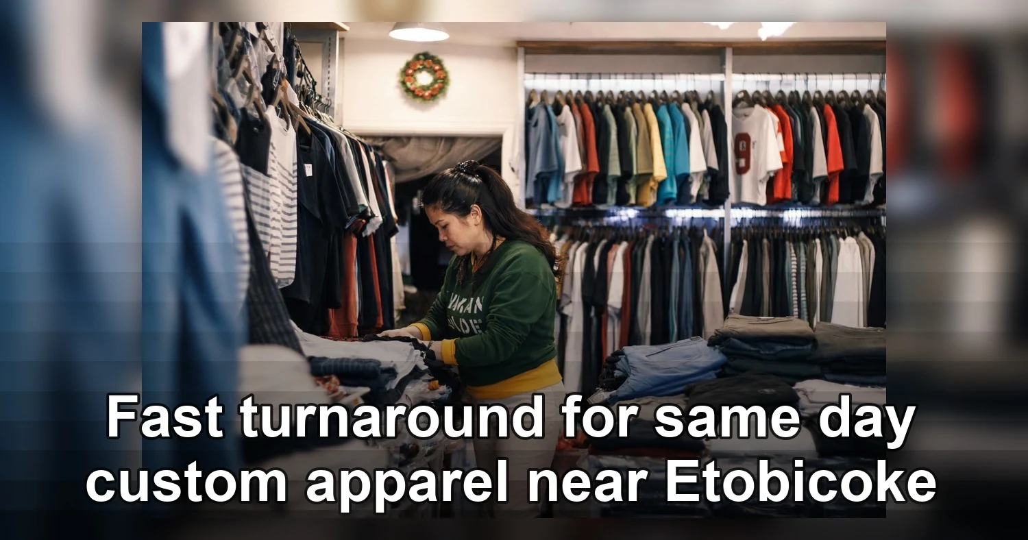 same day custom apparel near etobicoke — A woman organizing clothes in a cozy boutique clothing store with a wide selection o